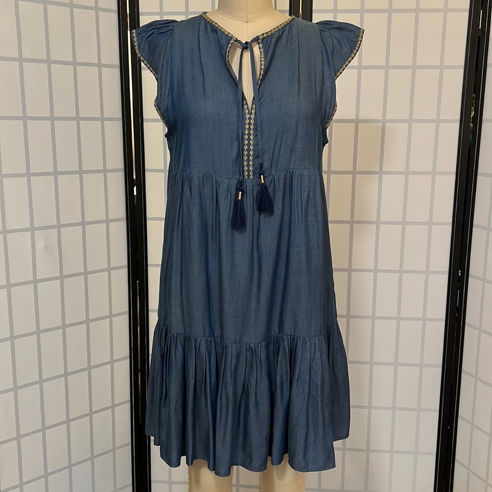 Tommy Bahama denim look dress with gold embroidery and tassel ties at neck